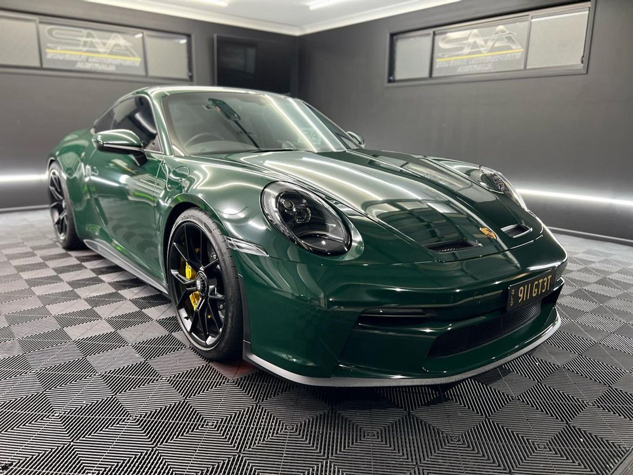 Close-Up of KPMF Gloss British Racing Green Vinyl Wrap Finish
A detailed close-up showing the smooth, reflective surface and subtle metallic flake of KPMF K75449 Gloss British Racing Green, ideal for full wraps or accent applications.