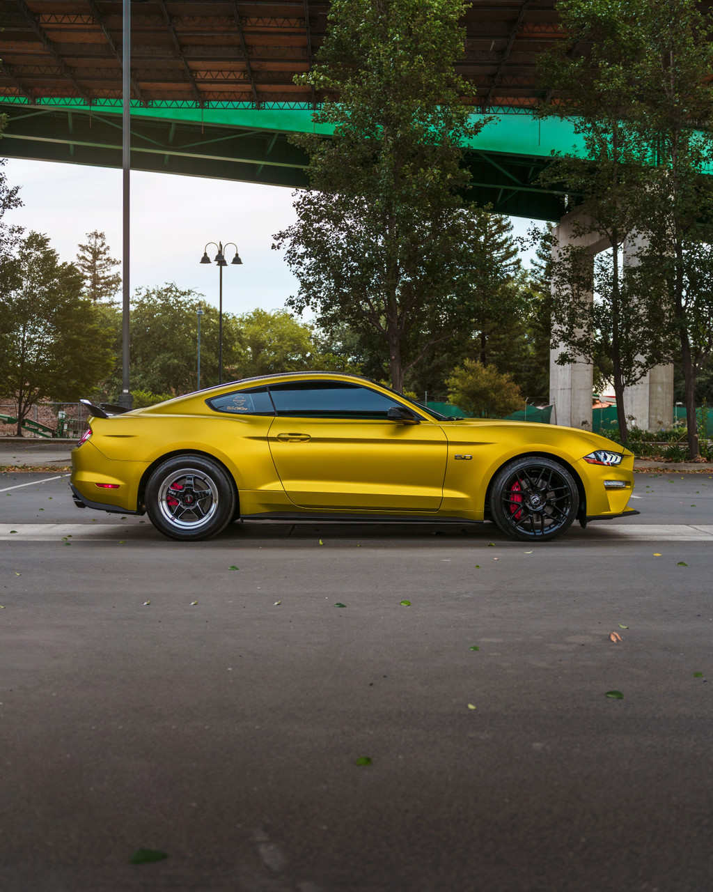 Ford Mustang Wrapped in KPMF Matte Iced Yellow Titanium Vinyl
A Ford Mustang fully wrapped in KPMF Matte Iced Yellow Titanium, showcasing the striking yellow tone with a smooth matte metallic finish that enhances the car’s aggressive styling and presence.