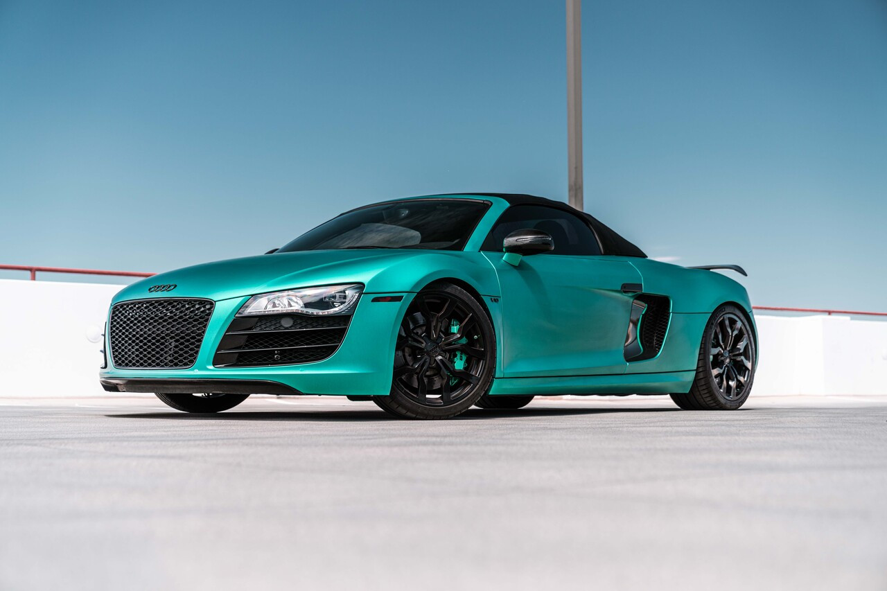 Audi R8 Wrapped in KPMF Matte Iced Green Titanium Vinyl
AN Audi R8 fully wrapped in KPMF Matte Iced Green Titanium, showcasing the smooth matte texture and subtle green metallic glow that brings a high-tech, modern look to the vehicle.