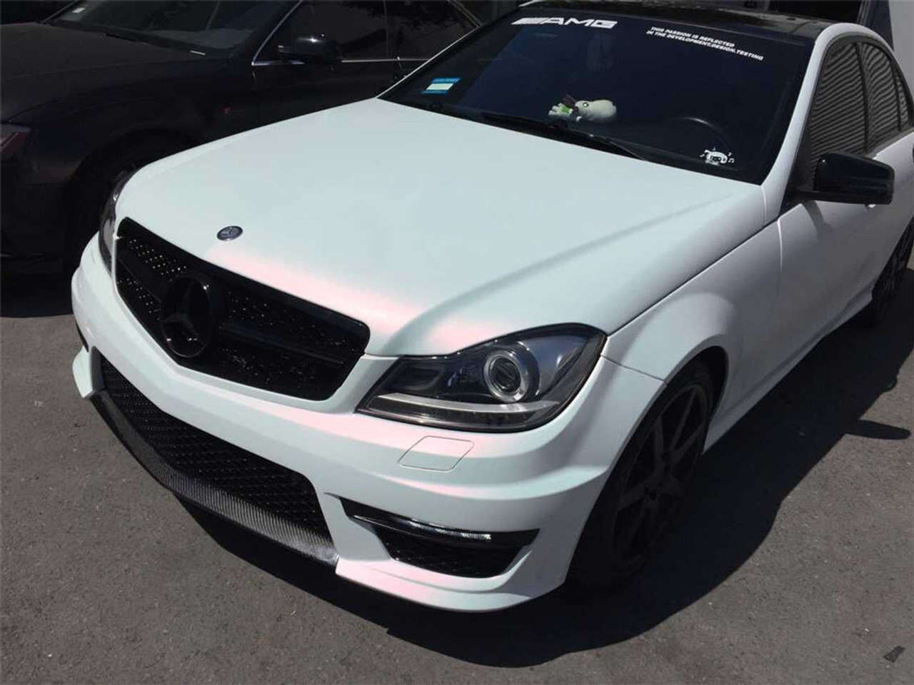 Car Panel Wrapped with KPMF Matte Pink Starlight Overlaminate
A vehicle panel wrapped with KPMF Matte Pink Starlight, featuring a soft pink hue and matte texture with fine shimmer from starlight flakes over a white base wrap.