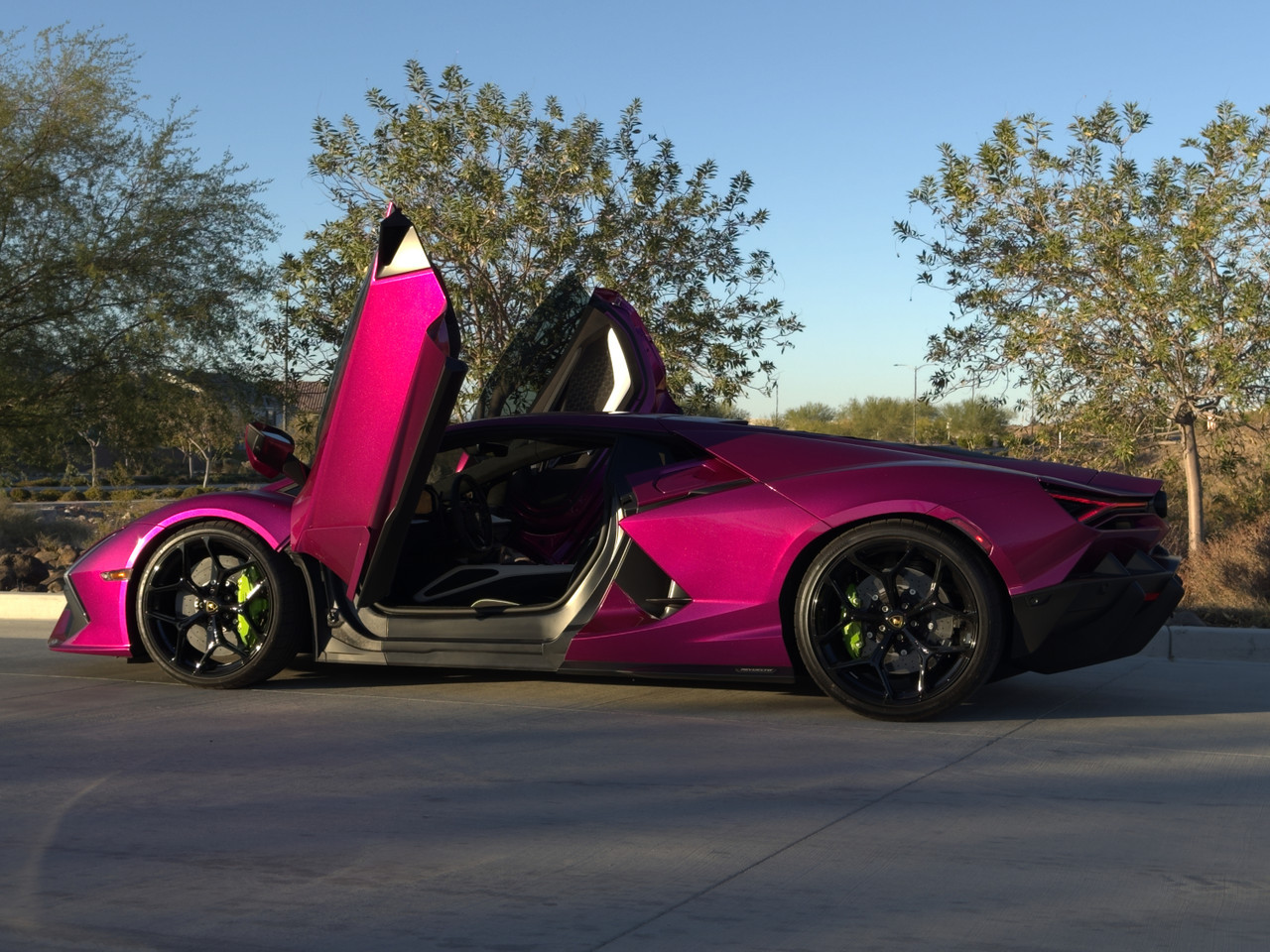 Roll of ORAGUARD® 2815GF Paint Protection Film on display, showcasing its glossy surface and flexible material properties.