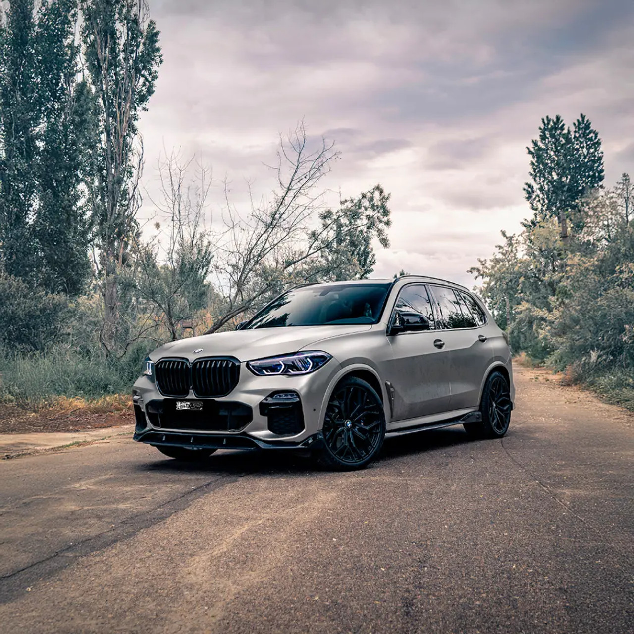 Gloss Grey Matter applied to a vehicle quarter panel, showcasing the high-gloss light grey sheen under natural light.