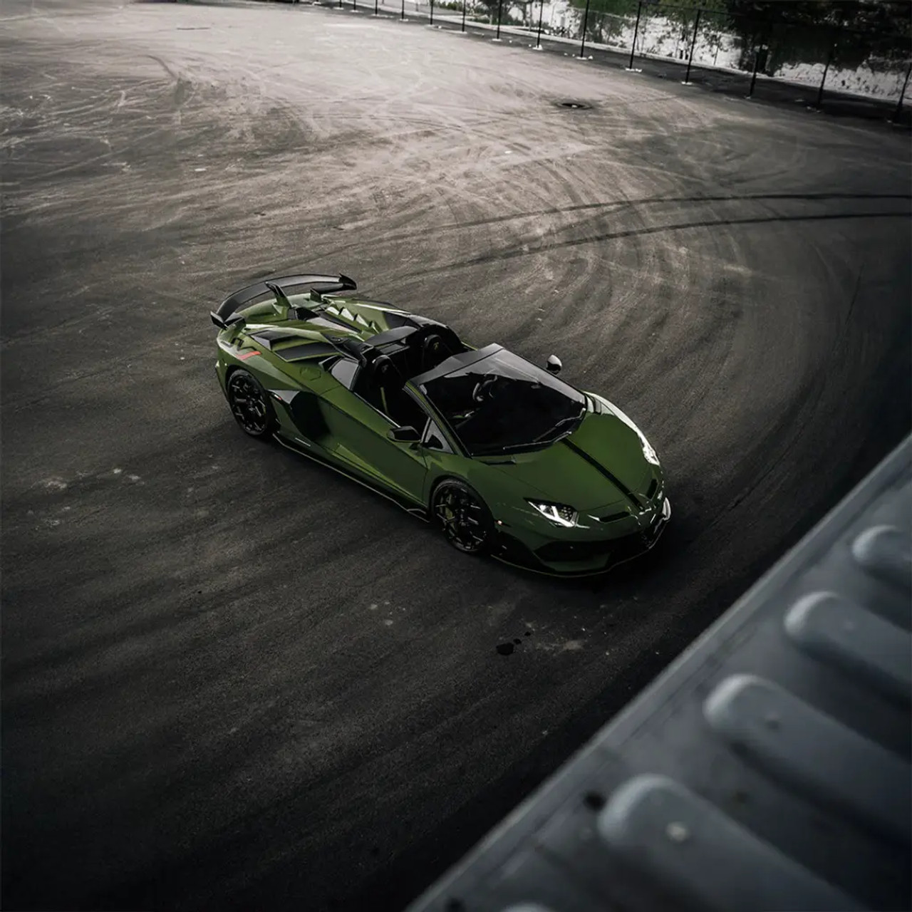 Satin Moss’terious Green applied to a vehicle side panel, displaying deep green saturation with a smooth, non-glare surface.