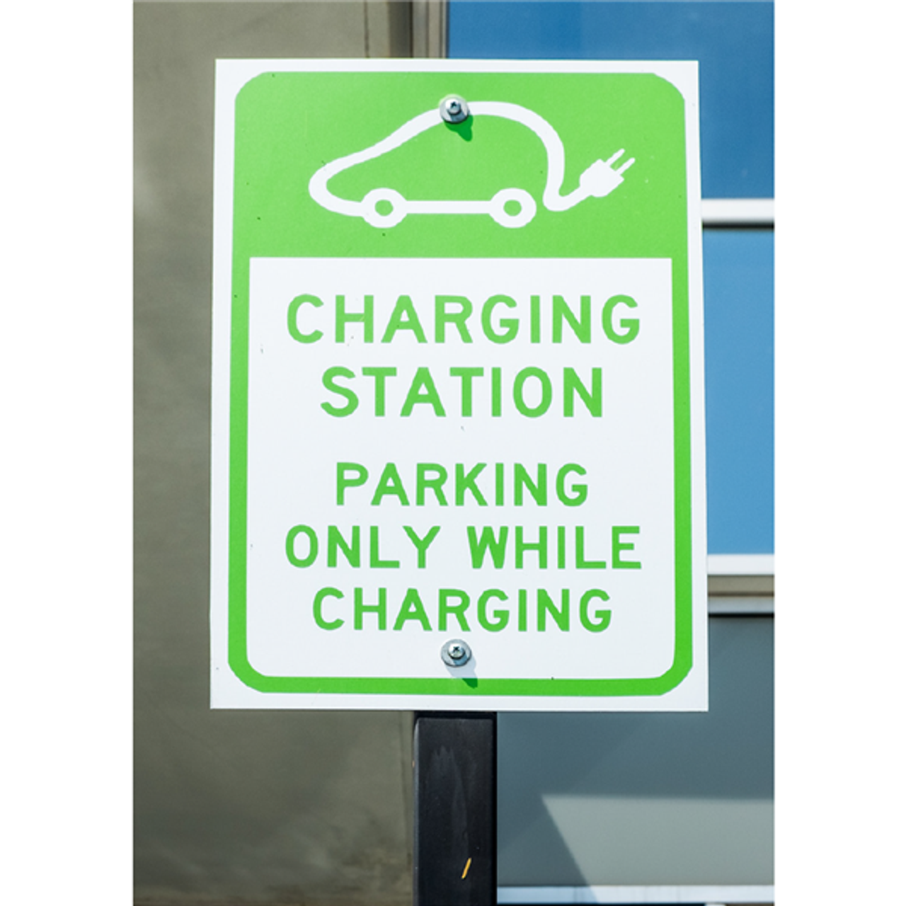 Roll of Nekoosa NextBond Premium Vinyl Print Media Gloss White 54-inch × 50-yard with high-peel removable air-egress adhesive for easy bubble-free installation applied to a sign after printing Roll of Nekoosa NextBond Premium Vinyl Print Media Gloss White 54-inch × 50-yard with high-peel removable air-egress adhesive for easy bubble-free installation applied to a sign after printing