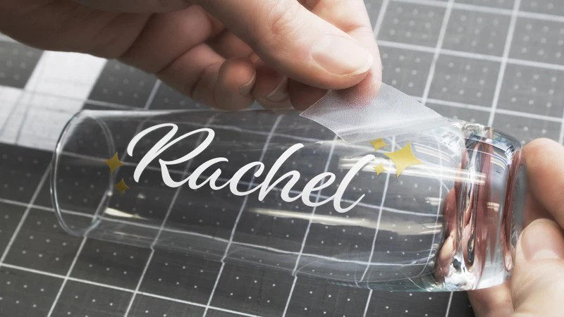 TransferRite Ultra 1310 clear transfer tape applied over cut vinyl lettering
