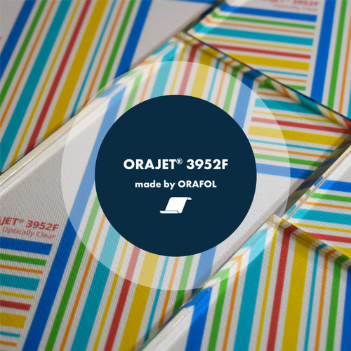 ORAJET 3952F is a 2-mil optically clear premium cast PVC film built for one job: printed graphics on glass that people still have to see through. The film and the adhesive are both optically clear, so there is no haze, no milkiness, and no adhesive pattern showing when you look through the window.