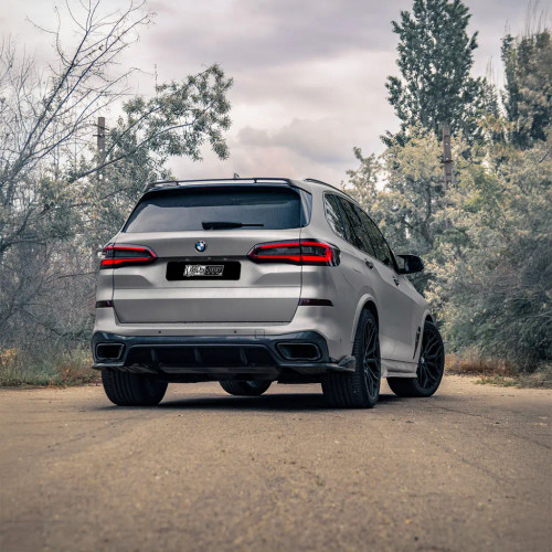 Gloss Grey Matter applied to a vehicle quarter panel, showcasing the high-gloss light grey sheen under natural light. Gloss Grey Matter applied to a vehicle quarter panel, showcasing the high-gloss light grey sheen under natural light.