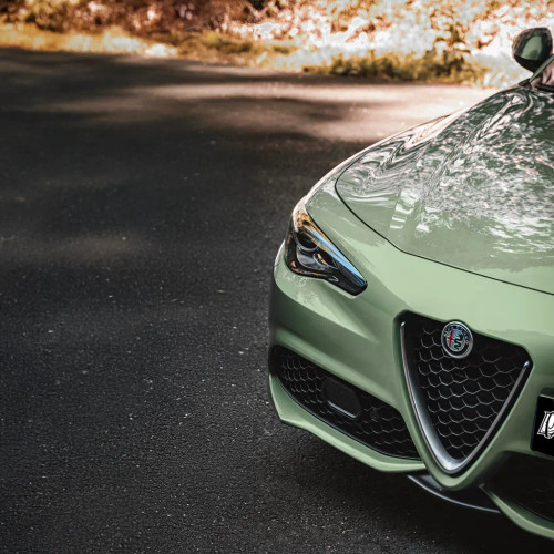 Satin Cacti-Verde applied to an SUV hood and fender, showing a soft satin sheen with modern green tone under daylight.