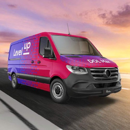 Close-up of Avery Dennison® DOL 1360 Max Gloss Overlaminate applied over a printed vehicle wrap, showing a mirror-like gloss finish across curves and recessed areas.