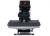 The MAXX® Clam Heat Press 11x15 by Stahls' sitting on a worktable with clamshell open, showing the compact platen, digital control panel, and durable steel frame.