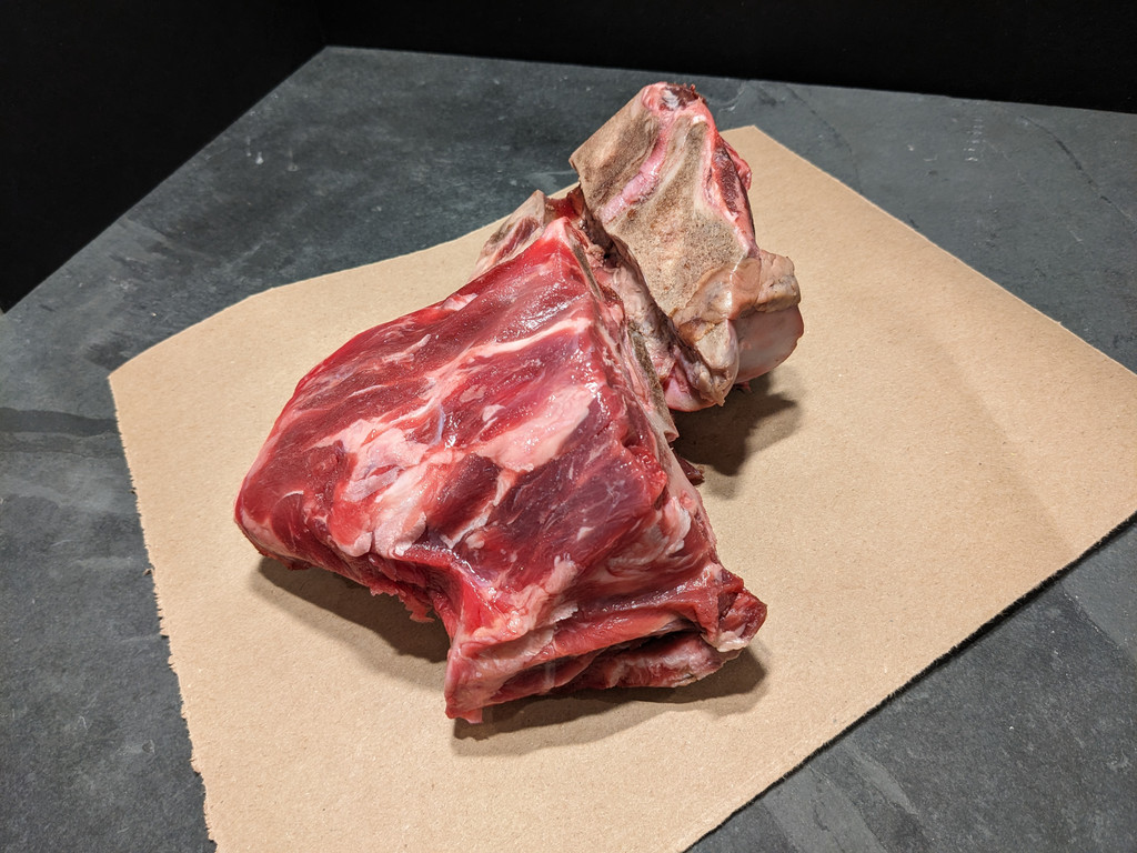 Bone-in Beef Stew Meat on butcher paper