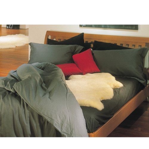 Sheepskin rug on couch Sheepskin rug on couch