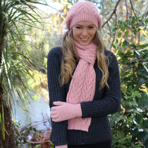 Female wearing beanie, scarf and gloves. Colour Rose