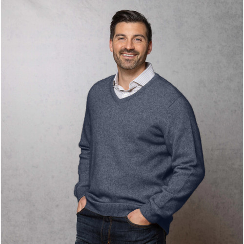 Man wearing the Noble Wilde - Merino & Possum Oxford Vee Sweater (NW1002) in the colour Neptune. Man wearing the Noble Wilde - Merino & Possum Oxford Vee Sweater (NW1002) in the colour Neptune.