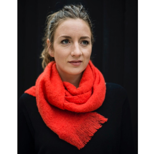 Model wearing Alpaca scarf in colour Hibiscus Model wearing Alpaca scarf in colour Hibiscus