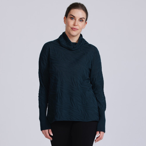 Women wearing sweater in the colour Forest.  Women wearing sweater in the colour Forest.