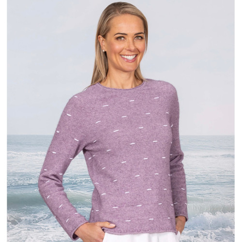Woman wearing the Showcase Crew in the colour Lilac. Woman wearing the Showcase Crew in the colour Lilac.