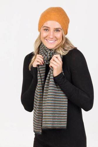 Woman wearing Native World - Merino & Possum Six Colour Scarf (NX894) in the colour combination Charcoal. Woman wearing Native World - Merino & Possum Six Colour Scarf (NX894) in the colour combination Charcoal.