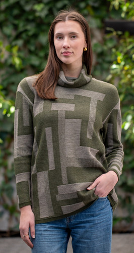Woman wearing Country Laine -  Cubist Jumper (CL0123L-IND2026) in the colour Olive/Chateau.