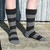 Striped Possum socks. Colour Black/Riverstone