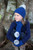 Top view of Child wearing beanie. Colour Lagoon