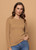 Woman wearing Bay Road Merino - Harper Crew (BR840) in the colour Caramel.