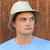 Man wearing light sand coloured Hydroex rain hat. Man wearing light sand coloured Hydroex rain hat.