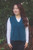 Woman wearing the Lothlorian - Merino & Possum Ride Vest (9650) in the colour Deep Cyan. 
