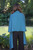 Woman wearing Lothlorian - Merino & Possum Brando Wrap (9993) in the colour Teal. 