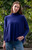 Woman wearing Country Laine - High Neck Sway Jumper (CL0122-IND2026) in the colour Atlantic.