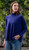 Woman wearing Country Laine - High Neck Sway Jumper (CL0122-IND2026) in the colour Atlantic.
