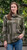 Woman wearing Country Laine -  Cubist Jumper (CL0123L-IND2026) in the colour Olive/Chateau.