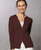Woman wearing zipped Catherine Cardigan in Espresso