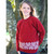 Girl wearing Jumper in colour red.