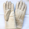 A pair of cream coloured Four Peaks hand stitched women’s lambskin gloves.