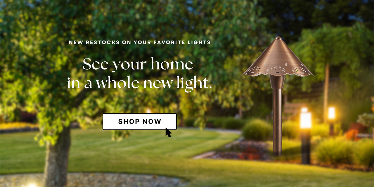 An Alliance light on a beautiful backyard lighting system.