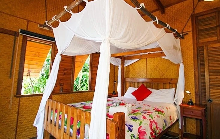 Cotton box bed canopy at 1770 Beach Shacks, Queensland, Australia