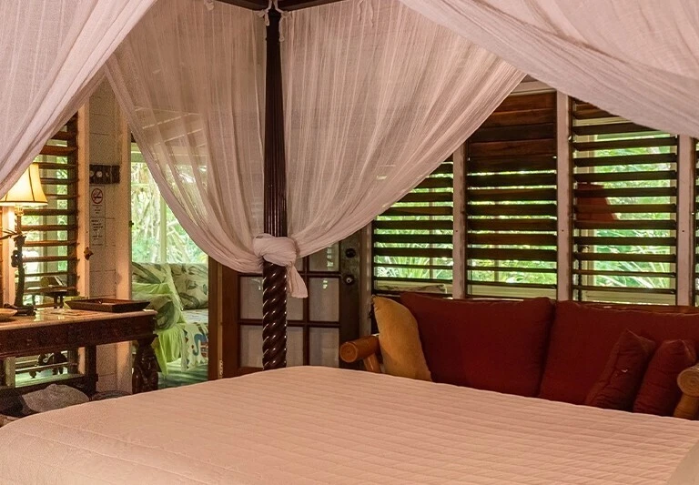Sheer bed canopy at Tingalaya Retreat, Negril, Jamaica