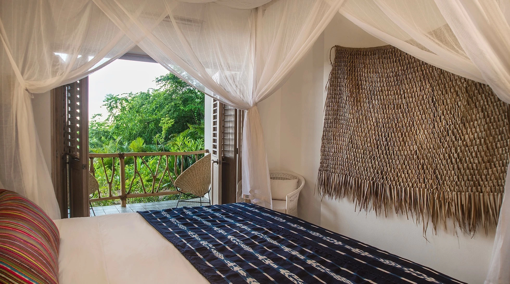 Queen cotton box bed canopy at Villa Valentin, Mexico