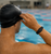 People wearing black RFID proximity wristbands for hands-free access control at gyms, pools, healthcare facilities, schools, and commercial buildings.
