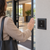 CAMDEN CM-336/41W SureWave 915MHz wireless touchless switch with double gang black faceplate and Wave to Open graphics