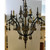 Currey and Co. Transitional Carved Wood and Iron Graycliff Chandelier