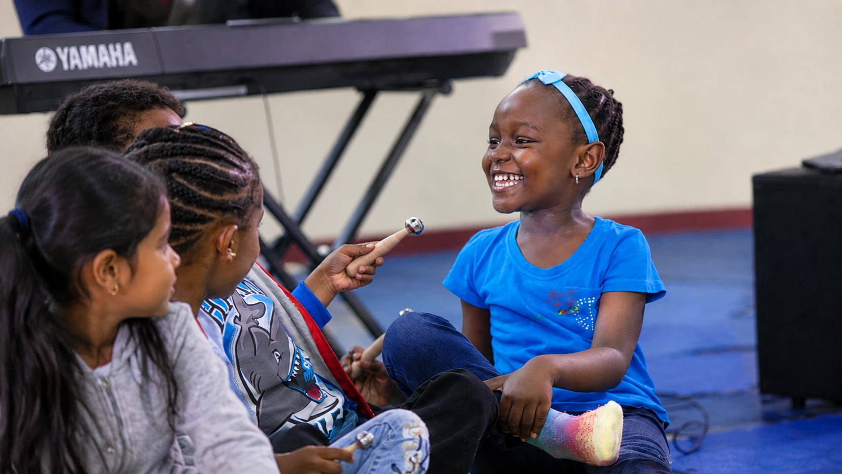 Young children enjoying an active music and movement experience