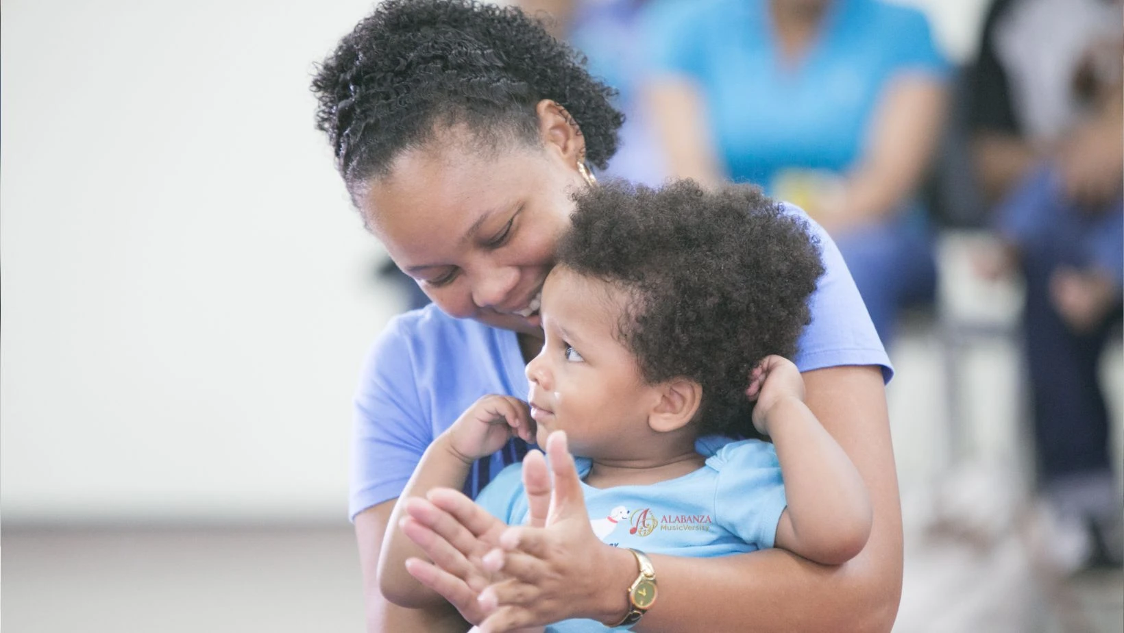 Toddler and caregiver connecting through music in Playful Piccolos