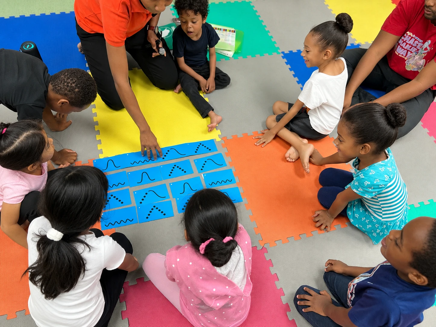 Children reading and experiencing rhythms in Preparatory Piano and Voice
