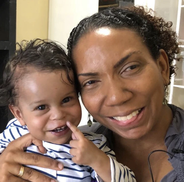 Ms Lisa with her child