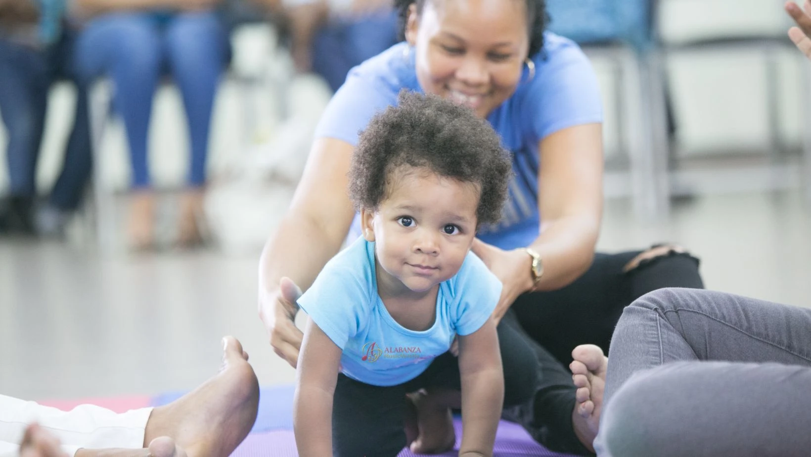 Toddler on the move during a Playful Piccolos session
