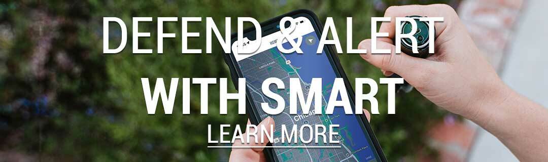 an iphone with text that reads "Deter and Alert with SMART Learn More"