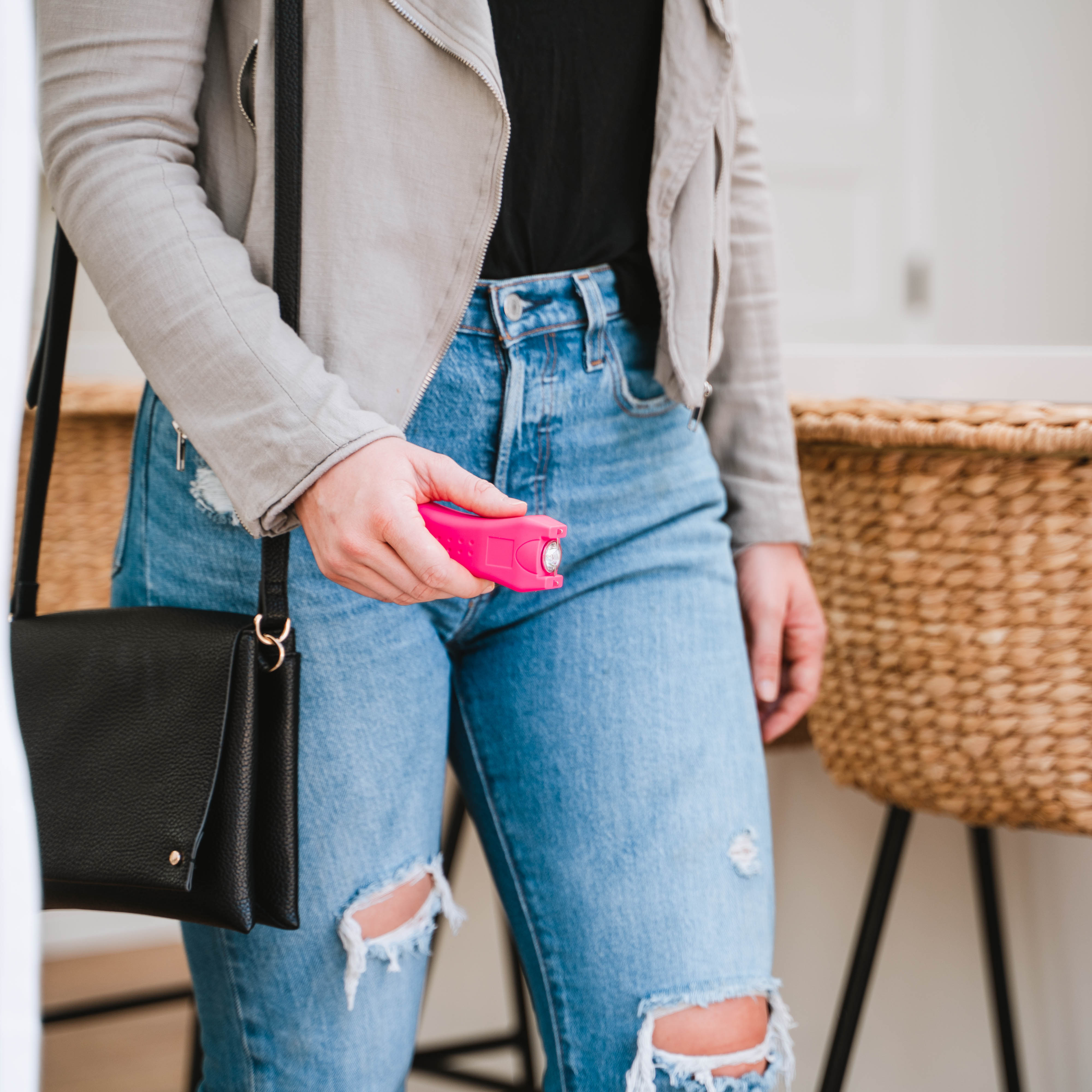 woman carrying stun gun