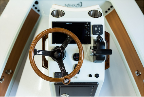 Edson teak and carbon PowerWheel displayed on a Drake Boats skiff Edson teak and carbon PowerWheel displayed on a Drake Boats skiff